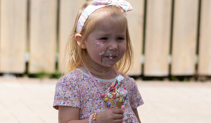 girl eating ice cream at Caudwell Children